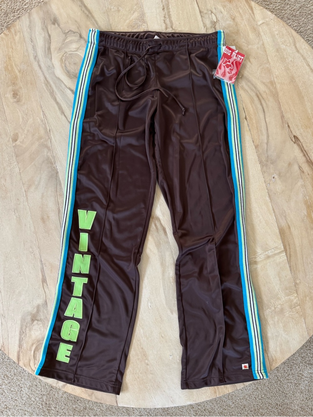 ‘VINTAGE’ brown sweatpants with blue and green detailing